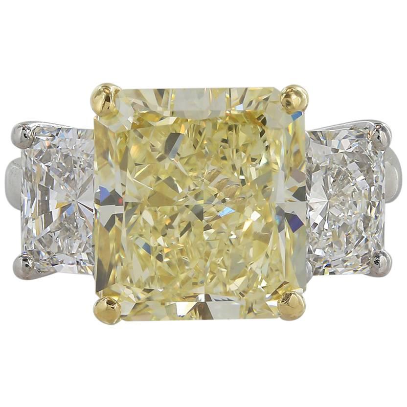 GIA Certified 5.87 Carat Fancy Yellow Three Stone Engagement Diamond Ring For Sale