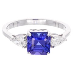 Bague octogonale en or blanc 18 carats avec tanzanite carrée de 2,08 carats et diamant poire de 0,51 carat