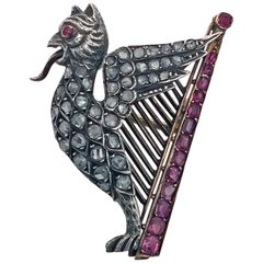 Antique Mythical 19th Century Griffin and Lyre Ruby, Diamond, Pearl Gold Brooch, French