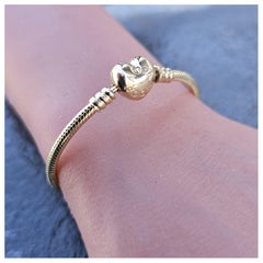 Pandora Moments 14k Gold Armreif mit Herzverschluss und Schlangenanhänger 6,5"