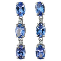 Tanzanite, diamonds 14k gold earrings studs