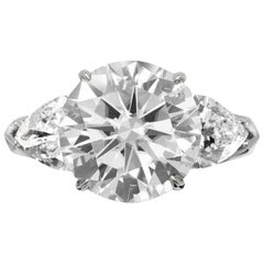 Anillo de platino con diamante talla redonda certificado por GIA de 10,01 quilates y diamante talla pera