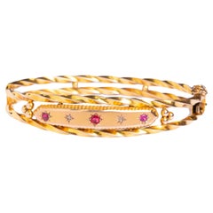 Antiguo brazalete eduardiano de oro de 9 ct con diamantes y rubíes en forma de estrella