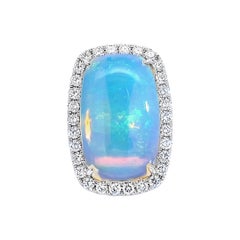 Stunning Opal Ring with Diamond Halo