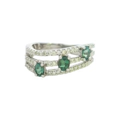 Elegant Silver Ring with Green Gemstones