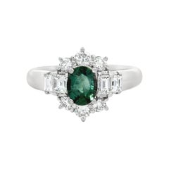 Elegante anello con smeraldo e diamanti