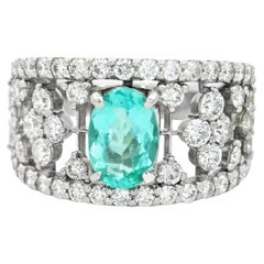 Elegante Anillo de Pariba y Diamantes