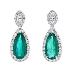 Boucles d'oreilles élégantes en émeraude et diamants