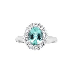 Élégante bague halo d'aigue-marine