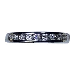 Bague de fiançailles d'éternité en platine avec diamant rond de 0,48 carat