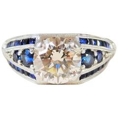 Vintage Ornate Custom-Made Sapphire and Champagne Colored Diamond Platinum Ring