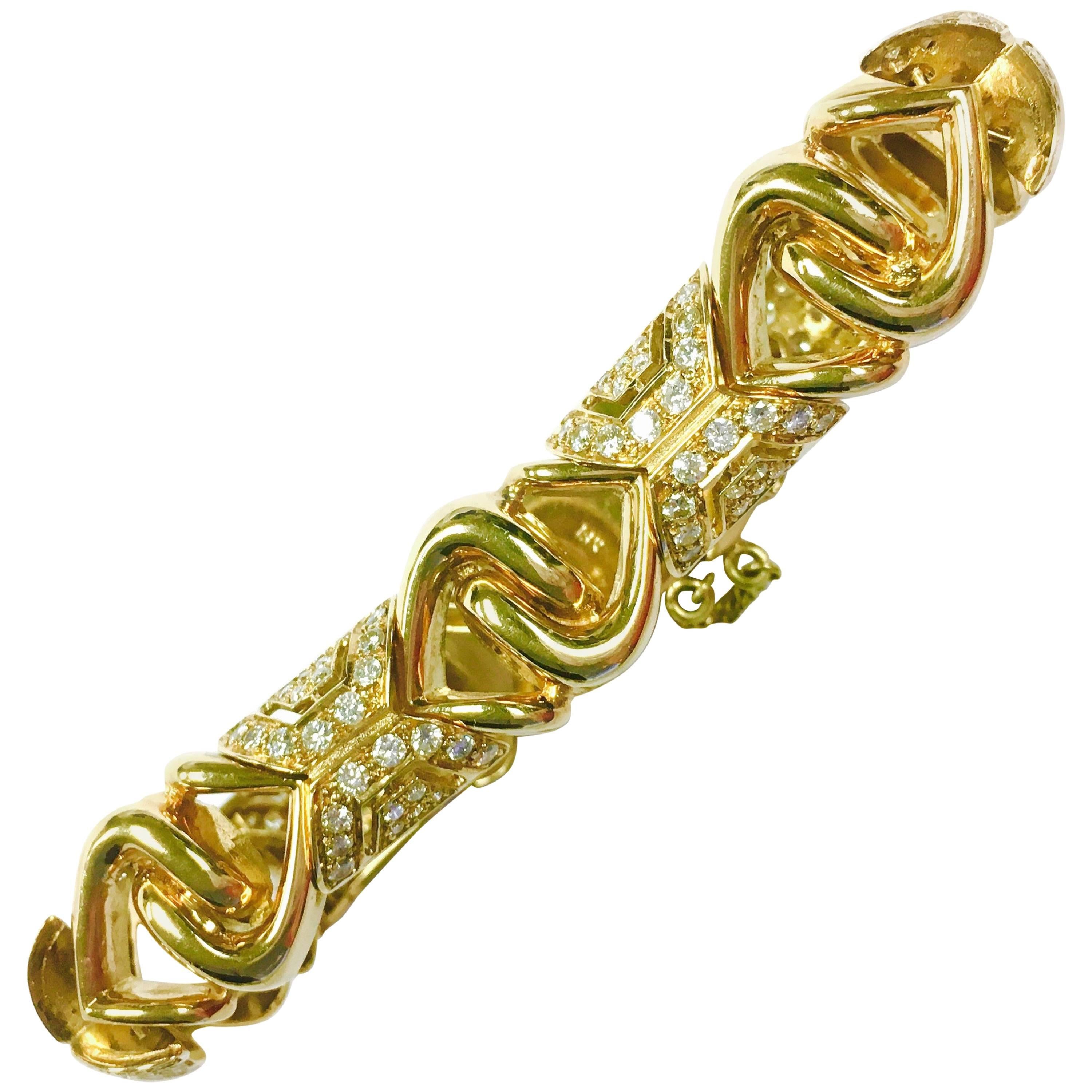 Crafted in 18K yellow gold, set with 5.0 carats of round brilliant cut diamonds. 
Color: F-G, Clarity: VS-1 to SI-1
7.25" length terminating in a hidden clasp with safet chain.
Weight: 49.4 grams