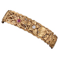 Bracelet floral antique en rubis et diamants par Riker Brothers