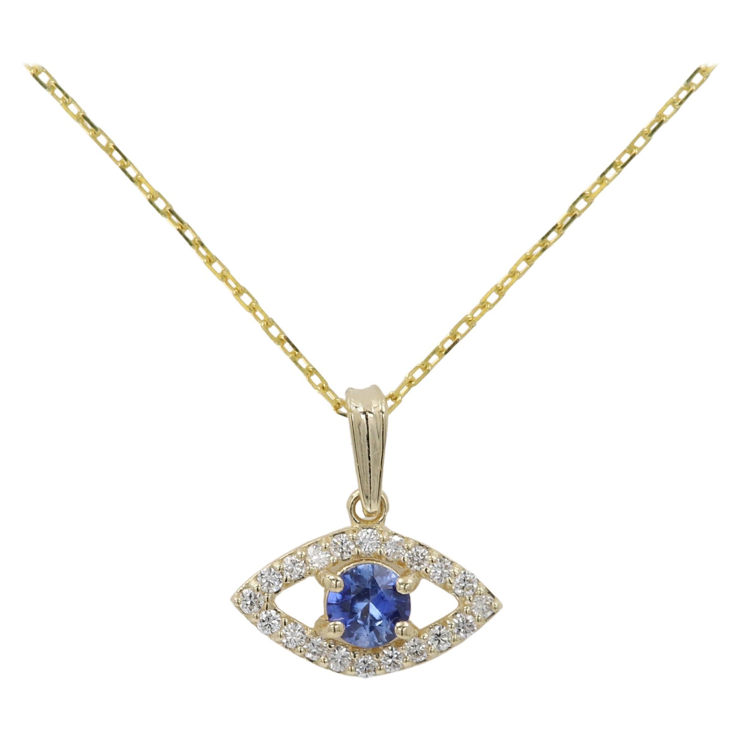 Mini Diamond Evil Eye 14 Karat Yellow Gold with Center Natural Blue Sapphire For Sale