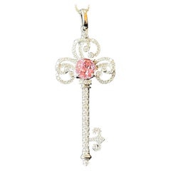 Certified Padparadscha Sapphire and Diamond Key Pendant in 18K White Gold