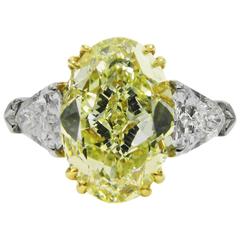 4.66 Carat GIA Certified Fancy Yellow Oval Diamond Platinum Ring 11