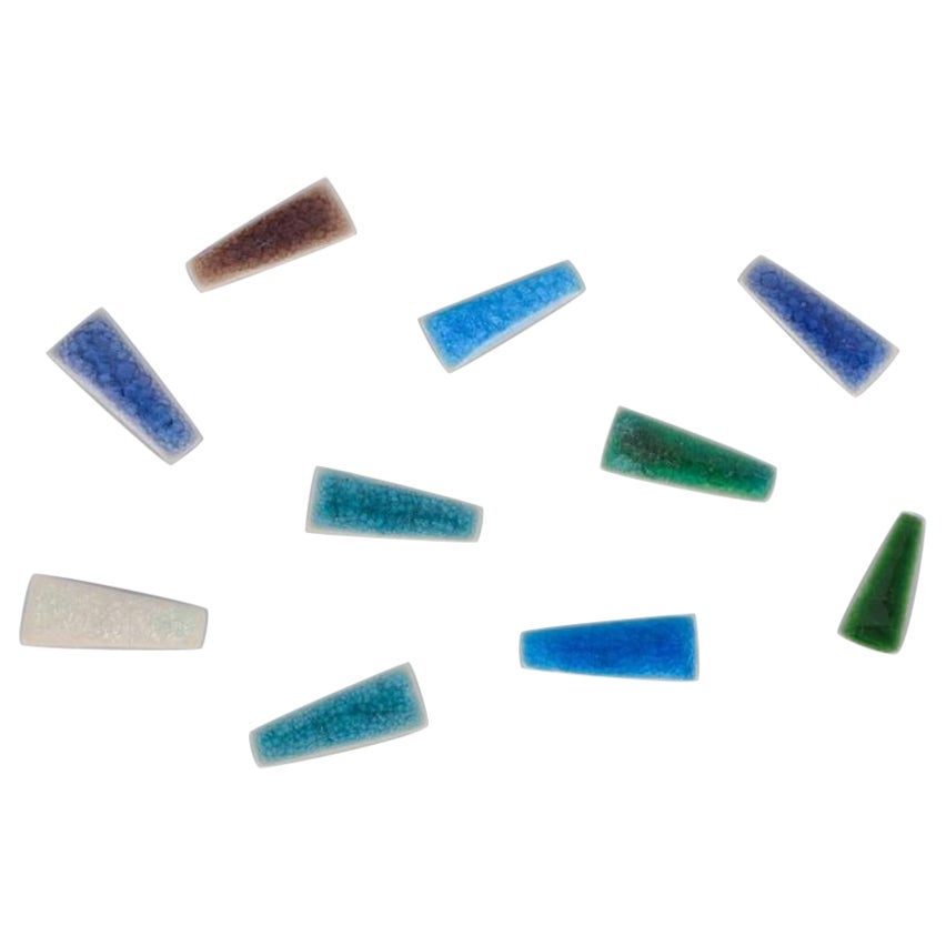 Ole Bjørn Krüger. Ten unique brooches in glazed stoneware.