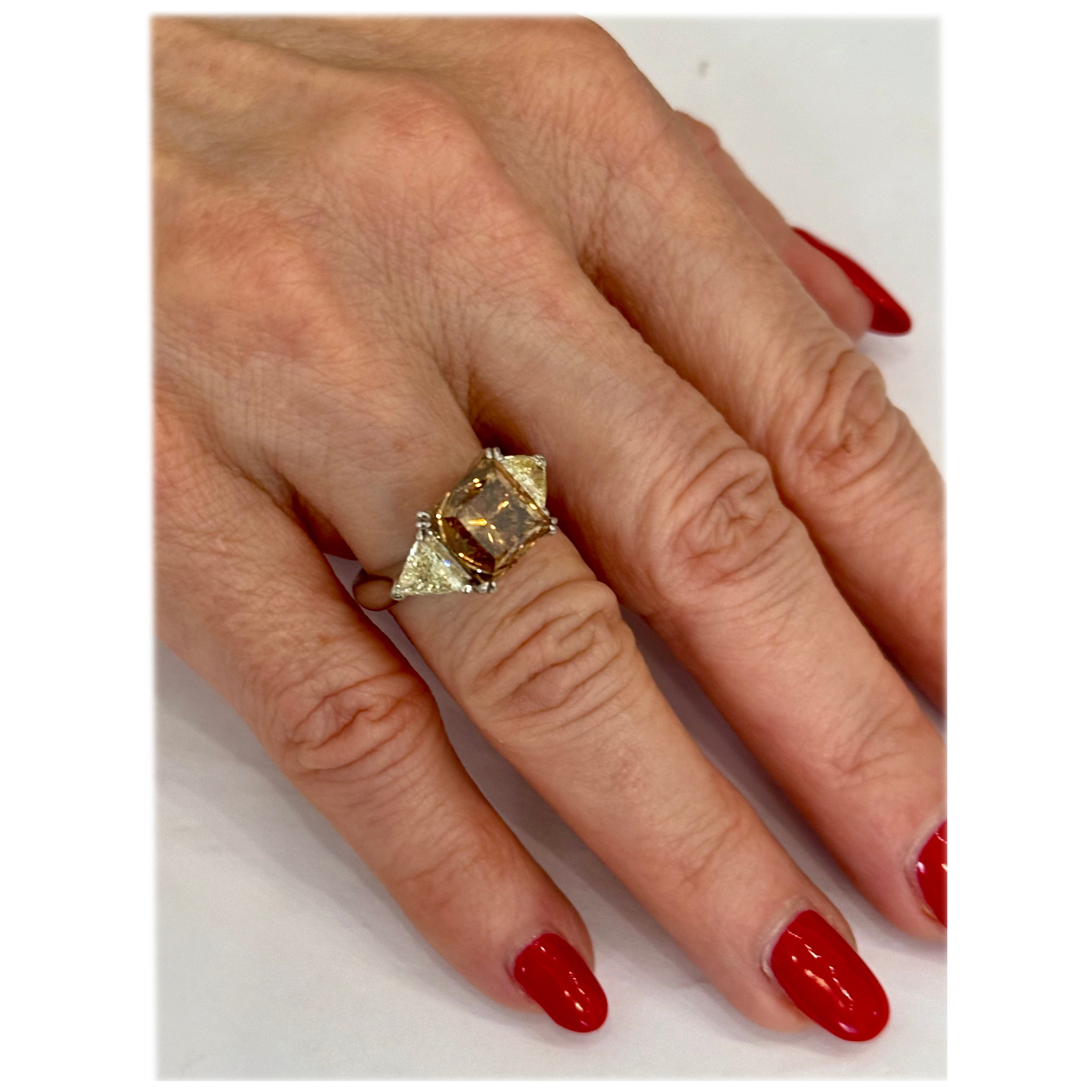 Fancy brown 6.123 ct Princess Cut Diamond with Trillion Diamond in Platinum For Sale