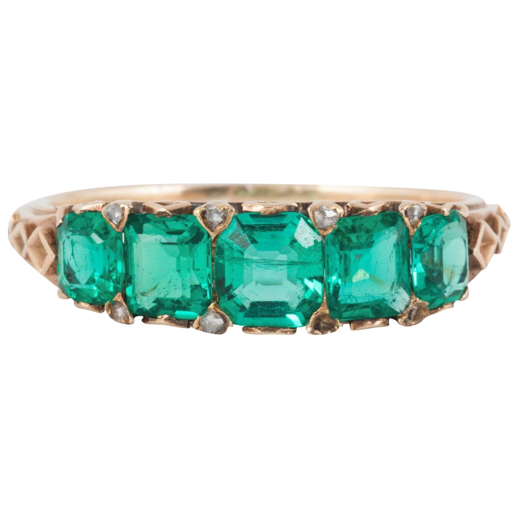 Ring, 19th Century Emerald and Gold Carved Half Hoop , circa 1880