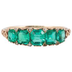 Ring, 19th Century Emerald and Gold Carved Half Hoop , circa 1880