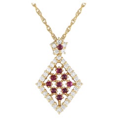 Halskette aus 18 Karat Gelbgold mit 0,55 Karat Diamant und Rubin