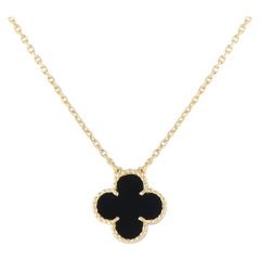 Van Cleef & Arpels, collier Alhambra en or jaune 18 carats et onyx