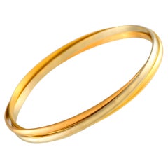 Cartier Trinity Armreif aus 18 Karat Rosé-, Gelb- und Weißgold