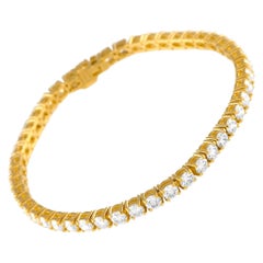 Bracciale tennis in oro giallo 18K con diamanti da 9,76 carati