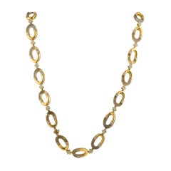 Boucheron Halskette aus 18 Karat Gelbgold mit 15,0 Karat Diamant und Kristall
