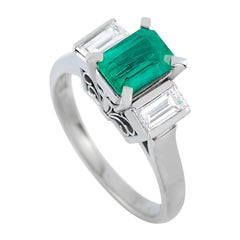 Platinum 0.56ct Diamond and Emerald Three Stone Ring