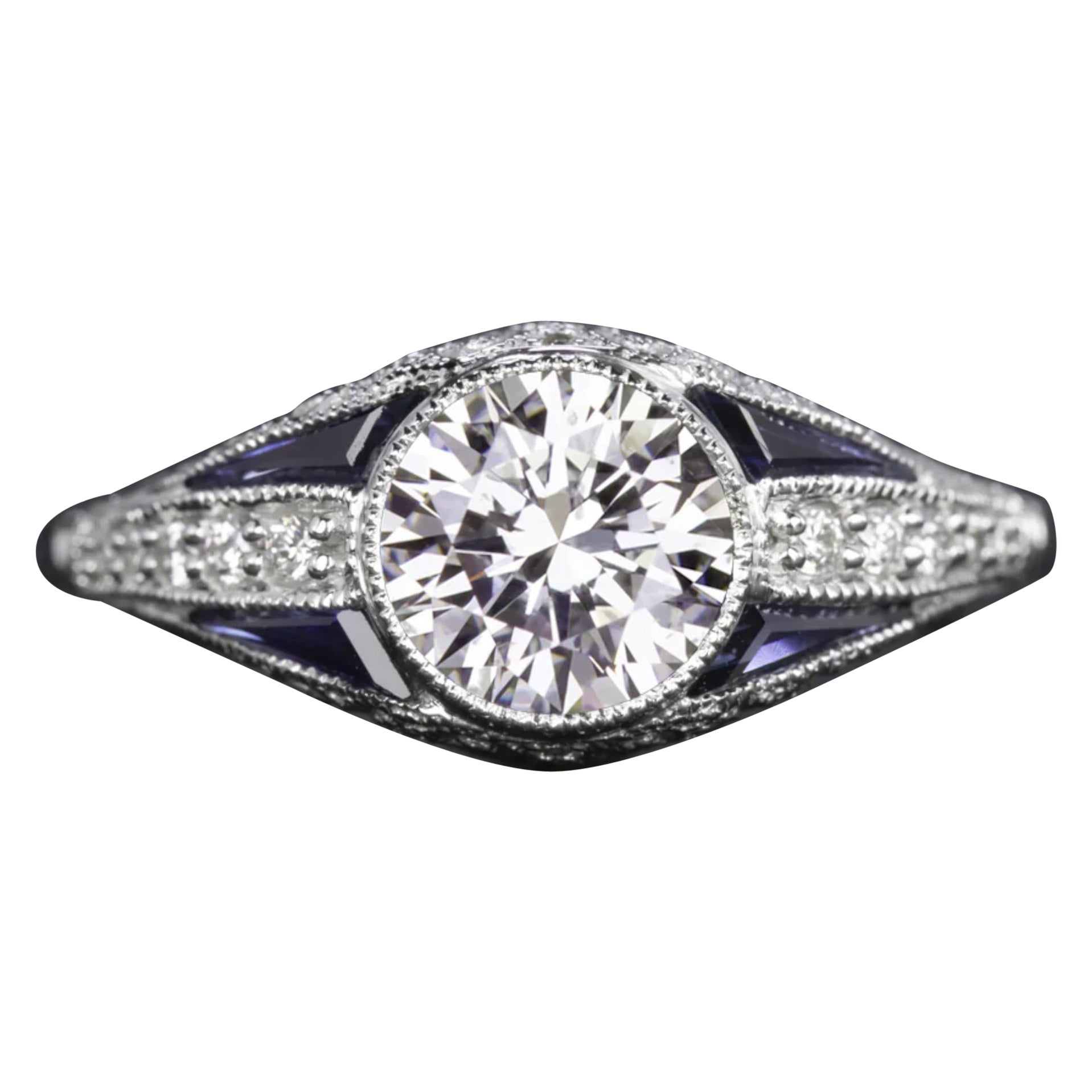 Art Deco-Inspired Round Brilliant Diamond and Sapphire Engagement Ring