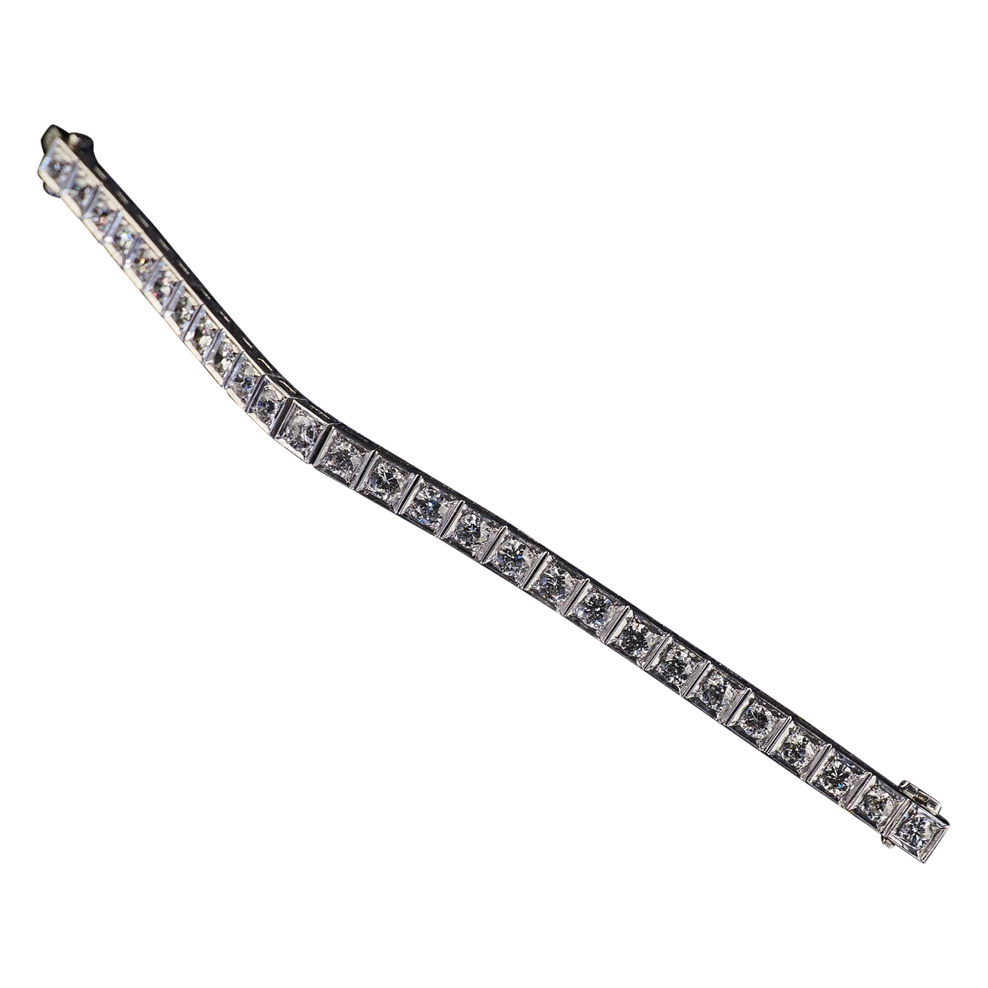 Bracciale tennis vintage retrò in platino con diamanti dal taglio transitorio
