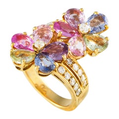 Anello con fiore in oro giallo Bvlgari da 0,65 carati con diamante e zaffiro multicolore