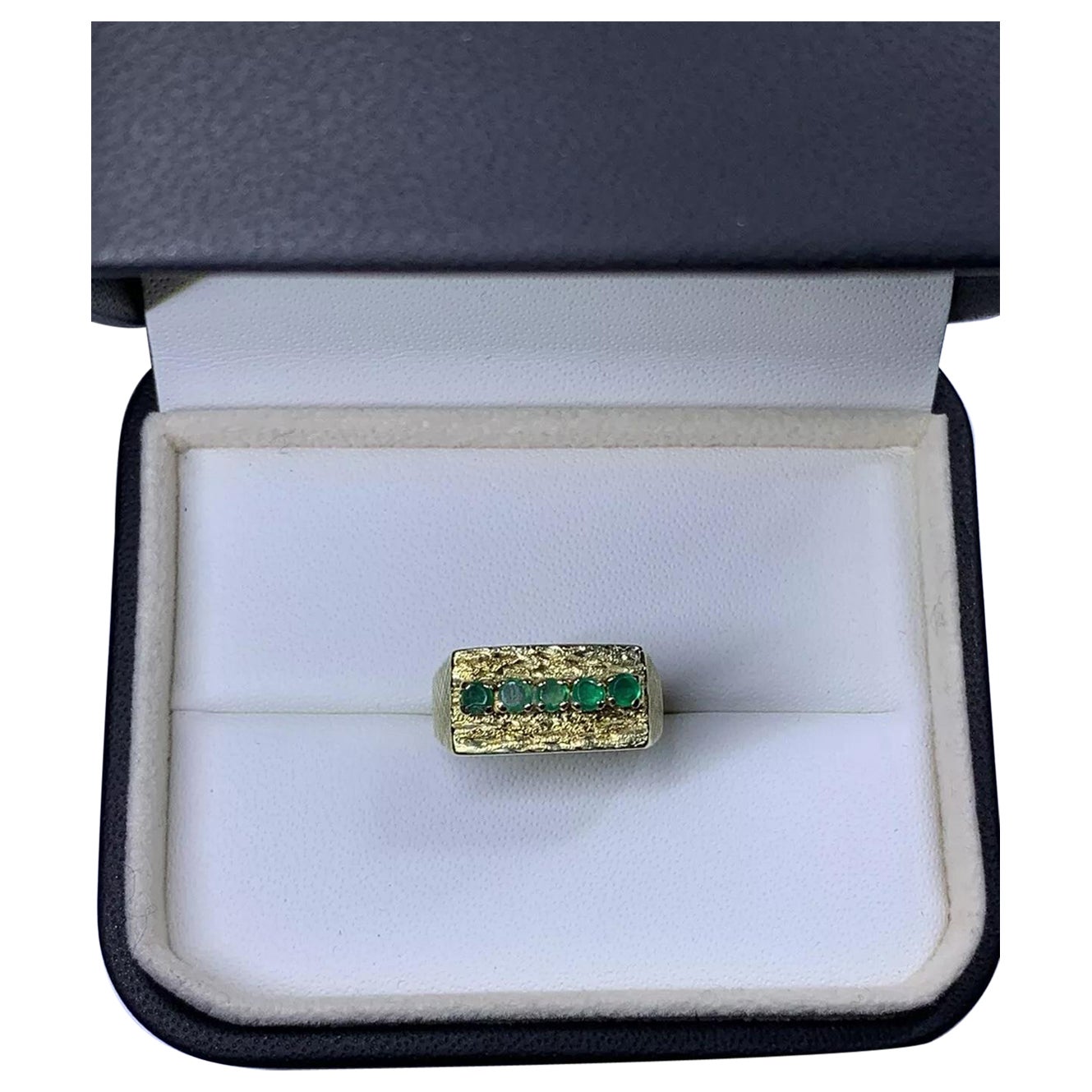 0.71ct Emerald green signet ring in 14ct yellow gold.