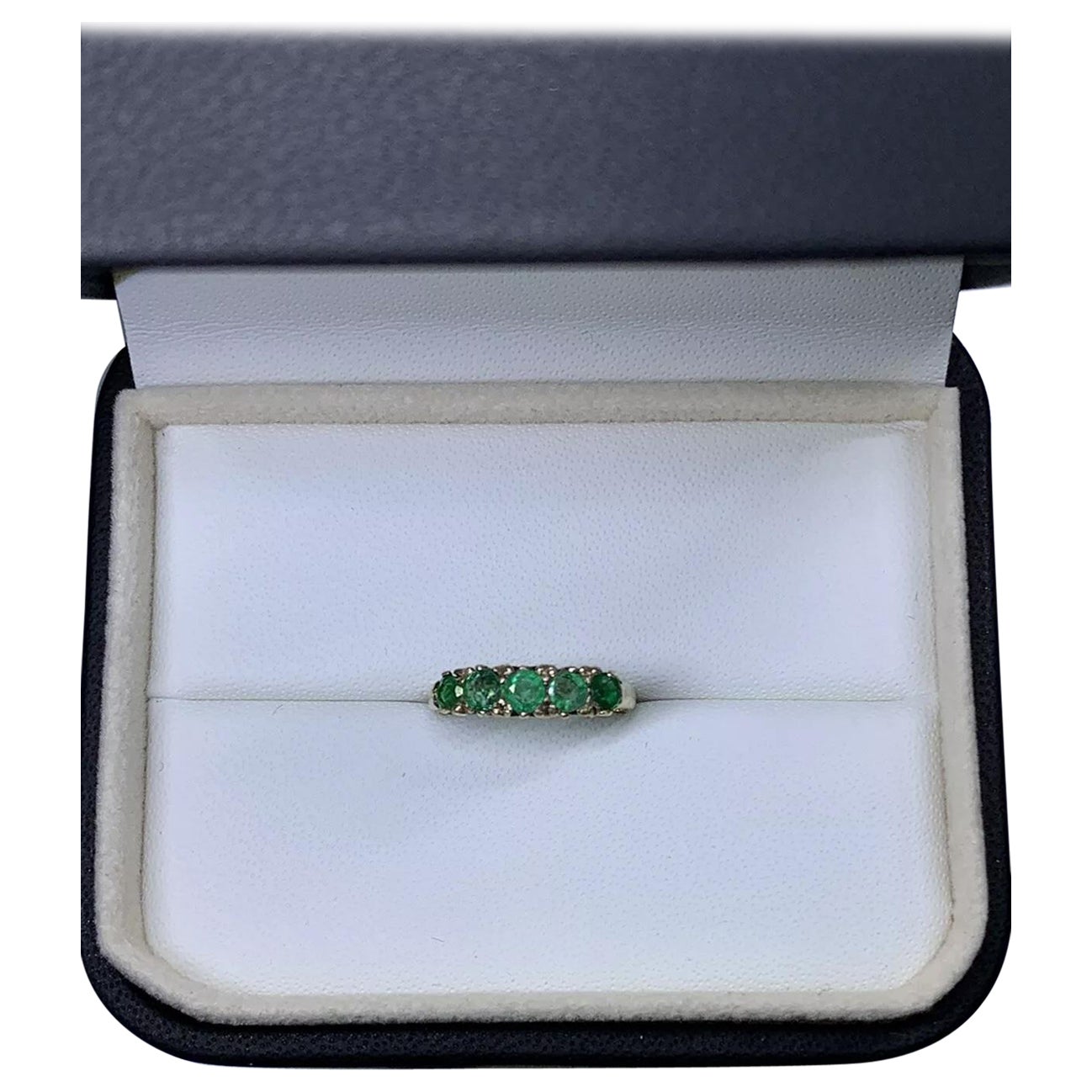 0.75ct Colombian green emerald eternity engagement ring 9ct yellow gold. For Sale