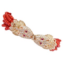Bracciale in corallo, rubini, diamanti, oro rosa 14 carati.