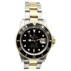 Rolex Submariner 16803 Cadran noir Or jaune 18K Acier inoxydable