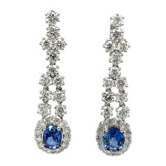 Boucles d'oreilles platine 4.37 carats saphir taille ovale diamant