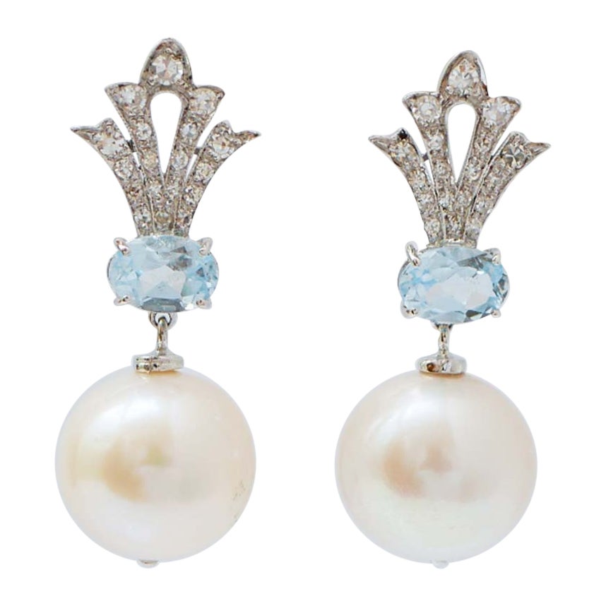 Perlas, Topacio Color Aguamarina, Diamantes, Pendientes de Oro Blanco de 14 Kilates.