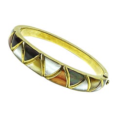 Brazalete de oro con incrustaciones de varias piedras Asch Grossbardt