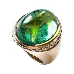 Bague en or rose 750 21 grammes avec 1 cabochon de tourmaline, 15,63 carats