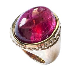 750/Anillo de Oro Rosa 21gr., con 1 Cabouchon de Rubelita, 16,10cts.