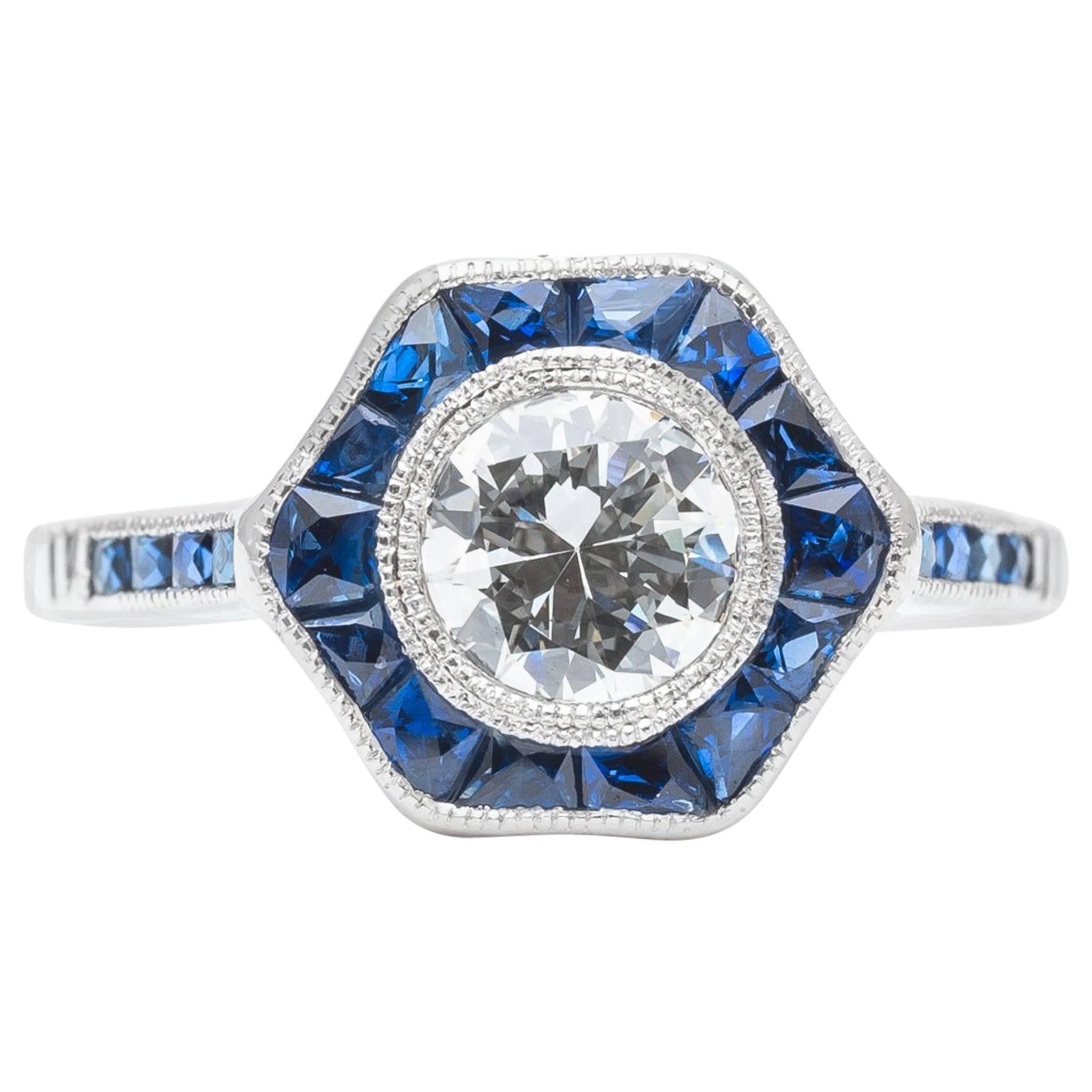 Diamond, Sapphire Flower Engagement Ring in Luxurious Platinum For Sale
