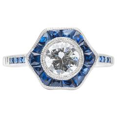 Vintage Diamond, Sapphire Flower Engagement Ring in Luxurious Platinum