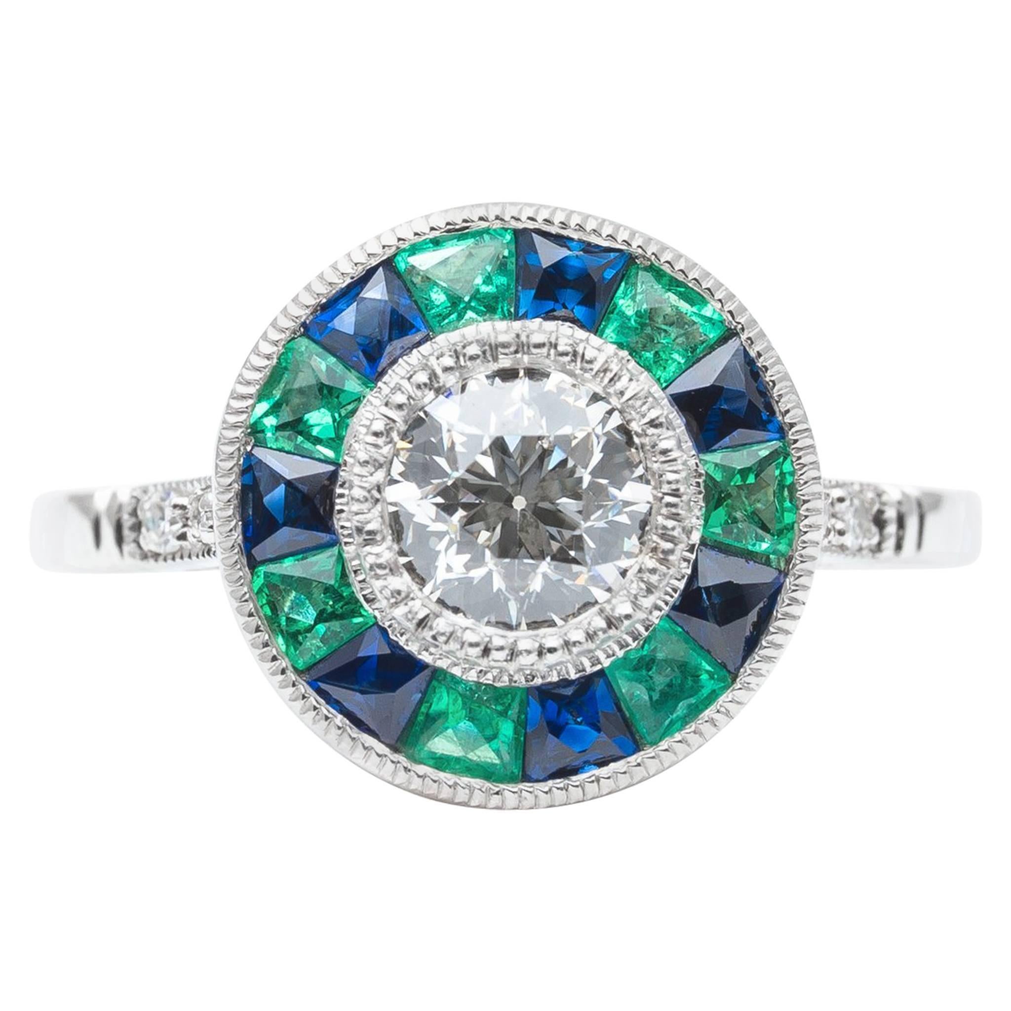 Exciting Emerald, Sapphire and Diamond Target Ring in Platinum For Sale