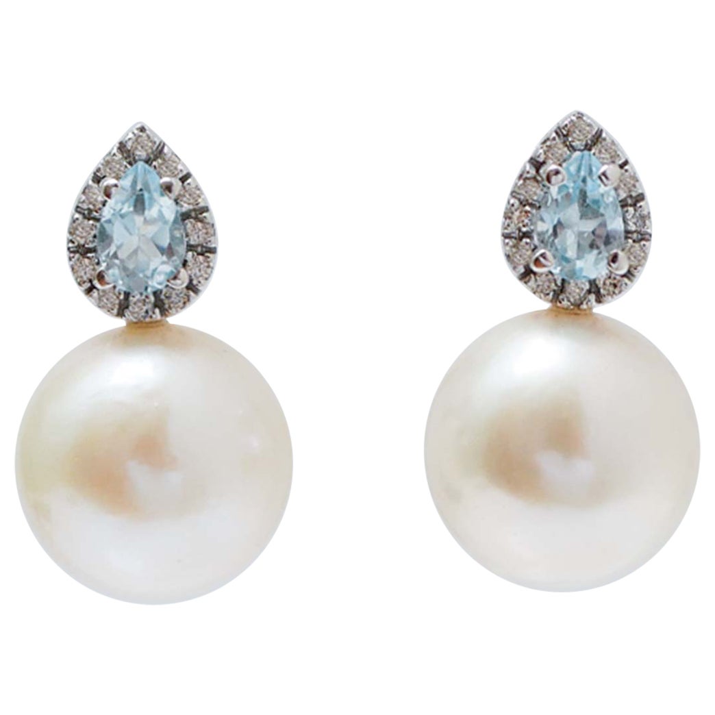 14 Mm White Pearls, Topaz, Diamonds, 14 Karat White Gold Earrings.