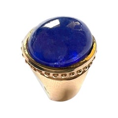 Anello 750/oro rosa 21gr. con 1 tansanite cabouchon 17,29cts.