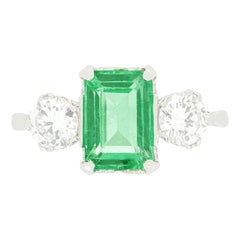Art Deco 1.70ct Emerald and Diamond Three Stone Ring, c.1920s