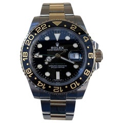 Rolex GMT-Master II Two Tone Yellow Gold Black Dial