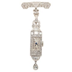 Montre de revers en platine et diamants Gubelin des années 1920